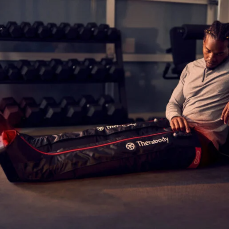 In situ image of seating male with legs extended and Jetboots on both legs