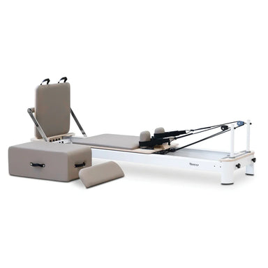 Angle Front View of Reeplex Flow Series Studio Reformer with Jump board in Brown with White Aluminium Frame