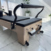 Adjustable footbar and headrest detail on the Milaron Maple Studio V3 Pilates reformer