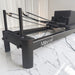 Milaron Pearl V3 reformer carriage with contoured shoulder pads and full-coverage microfibre leather upholstery