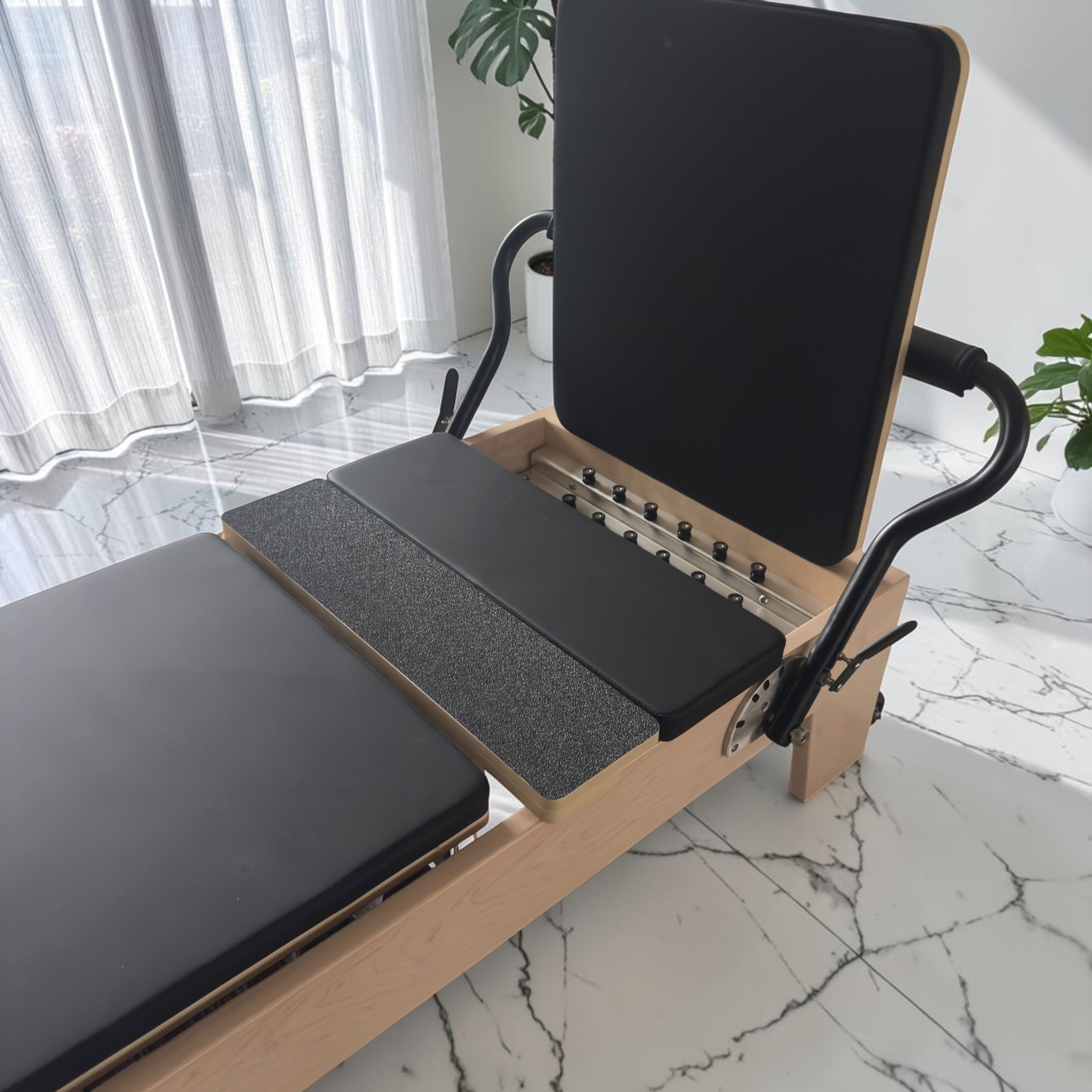 Milaron Maple Studio V3 reformer carriage upholstered in full-coverage microfibre leather with reinforced stitching