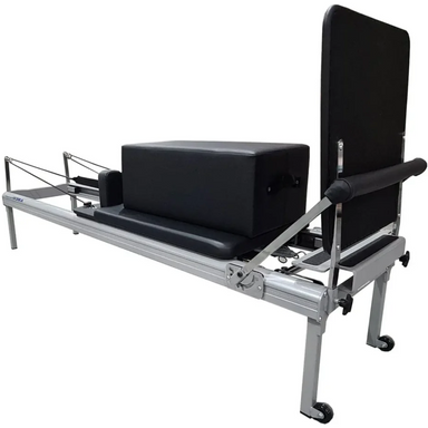 Angle Side View of ABCO Clinical Reformer with Aluminium frame and sitting box and jumpboard attached