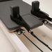 Extreme Close Up of Shoulder Pads and Headrest in black for Core Collab Queen Studio Reformer