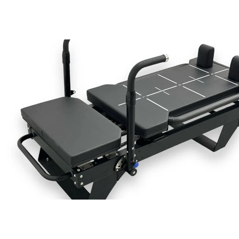 Close Up Aerial View of Black Core Collab Sculptformer Pilates Reformer on White Background