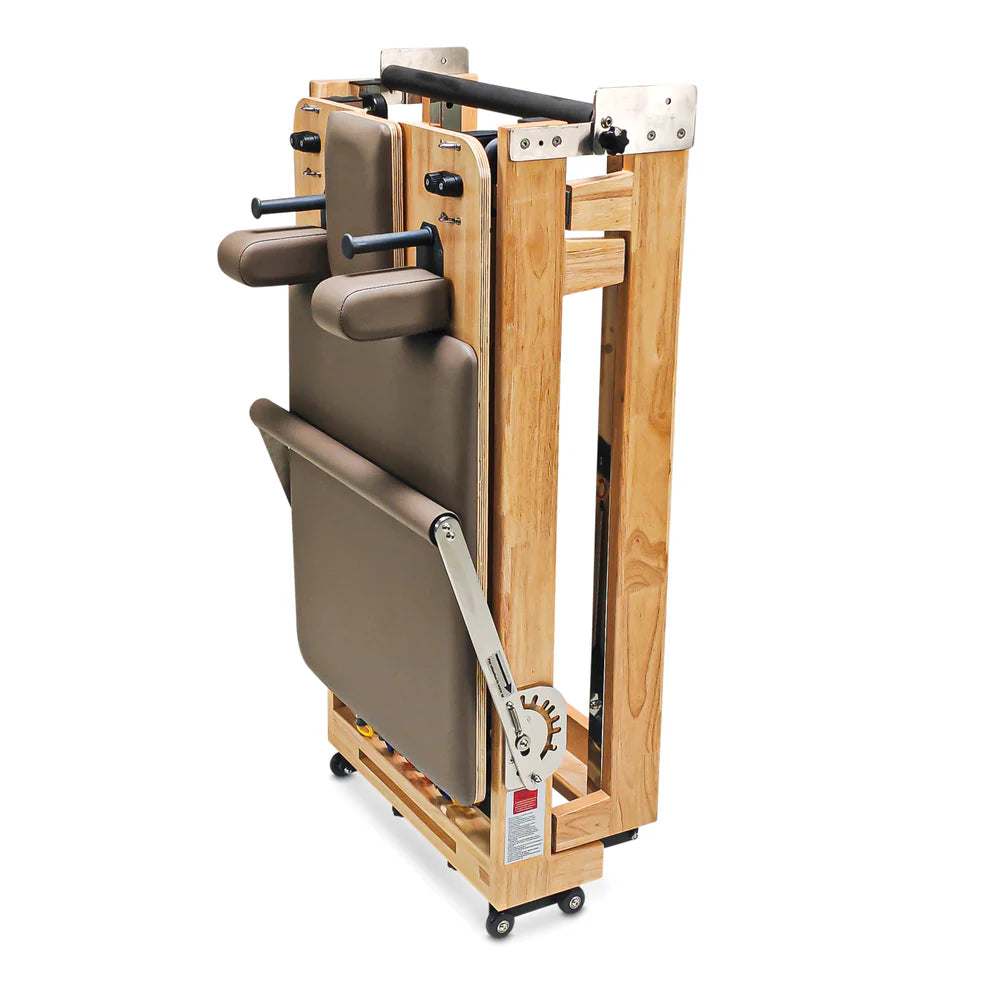 Front standing view of Impact Fitness Foldable Pilates Reformer in mocha