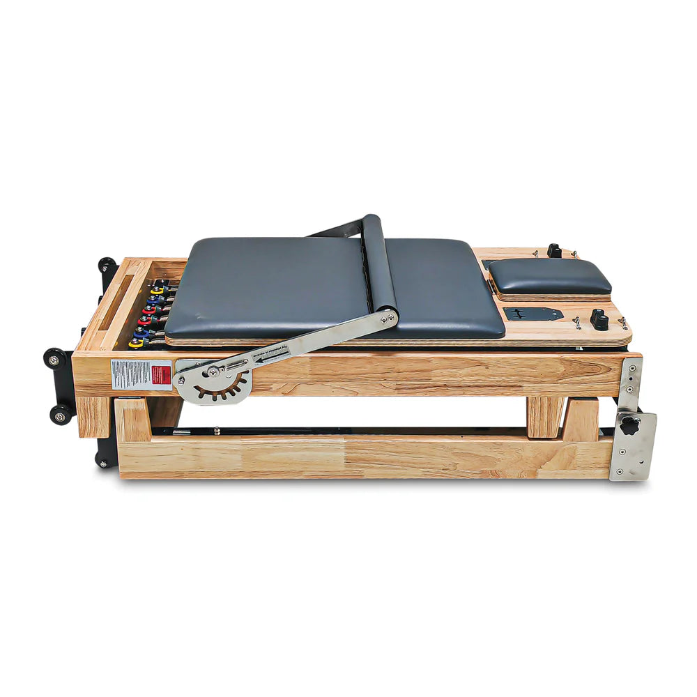 Flat top view of Folded Impact Fitness Foldable Pilates Reformer in Dark Grey