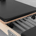 Close up aerial view of pilates reformer springs
