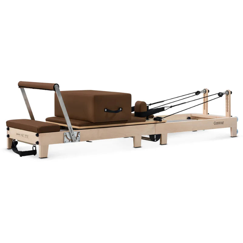 Side view Lifespan Fitness Contour Wooden Pilates Machine in Brown with footbar up on white background