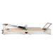 Full Side View Lifespan Fitness Contour Wooden Pilates Reformer in Beige on white background