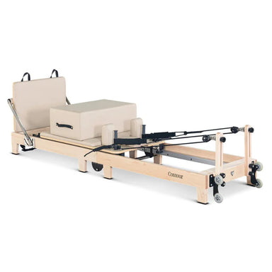 Lifespan Fitness Wooden Pilates reformer machine in beige with sitting box and jumpboard on a white background