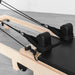 Close up Shoulder pads and straps of Lifespan Fitness Wooden Pilates Reformer