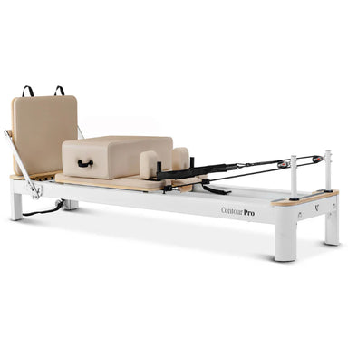 Aluminium Reformer in Beige Full Side View on an angle on white background with accessories on top of reformer
