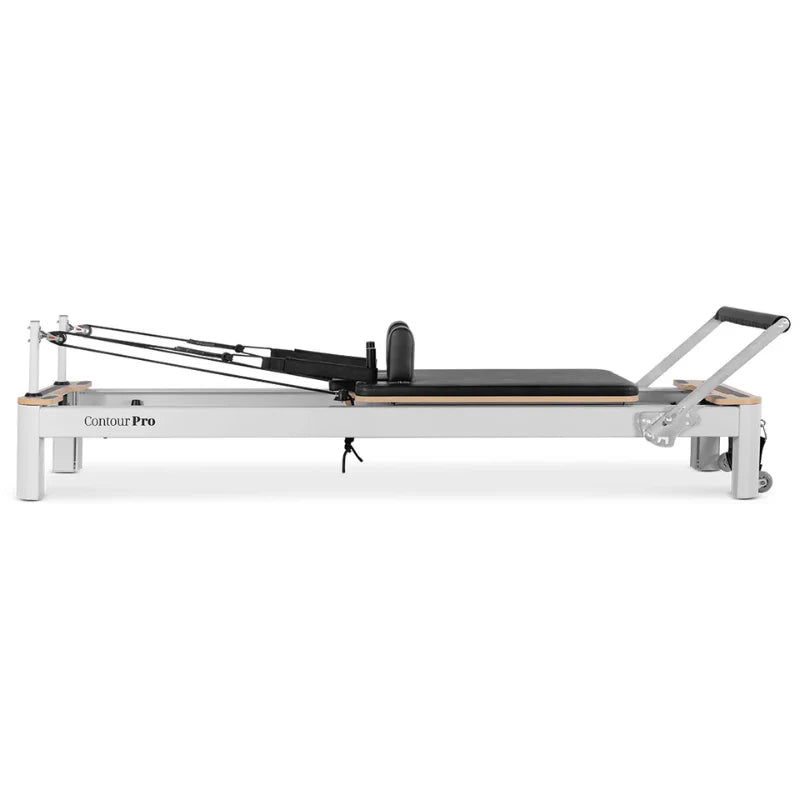 Full Side View of White aluminium Pilates reformer on a white background