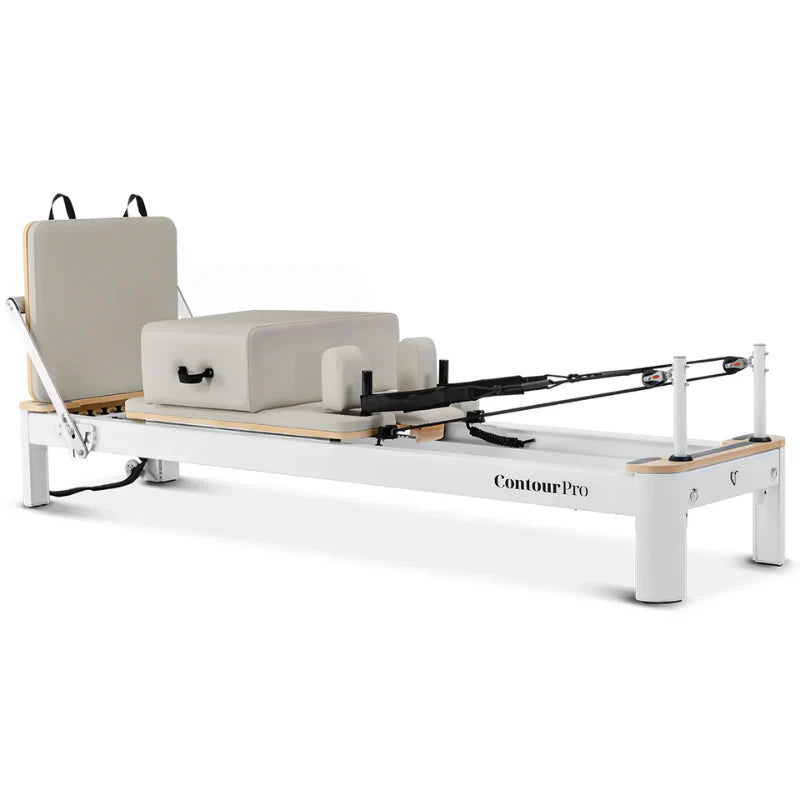 Full Side View on angle of White Aluminium Pilates Reformer with Jumpboard attached on white background