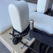 Close up of creme carriage for Milaron Maple Foldable reformer showing extreme close up of creme shouder rest and head rest