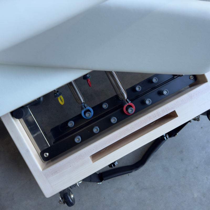 Aerial view of spring system for Milaron Maple Foldable Reformer