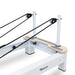 Pulley Riser Close Up of Reeplex Flow Series Studio Reformer with White Aluminium Frame