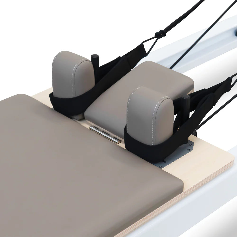 Carriage Close Up of Reeplex Flow Series Studio Reformer in Brown with White Aluminium Frame