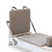 Jumpboard Close Up of Reeplex Flow Series Studio Reformer in Brown with White Aluminium Frame
