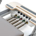Close Up of Springs for Reeplex Flow Series Studio Reformer with Jump board in Brown with White Aluminium Frame