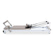 Side View of Reeplex Flow Series Studio Reformer with Footbar in Brown with White Aluminium Frame