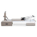 Side View of Reeplex Flow Series Studio Reformer with Jump board in Brown with White Aluminium Frame