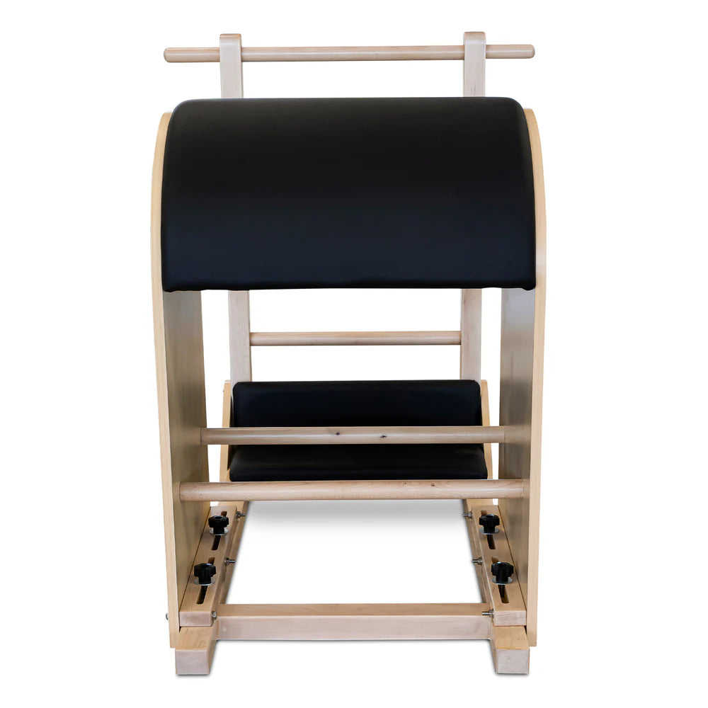 Back view of Ladder Barrel showing arch in black upholstery with wooden ladder behind
